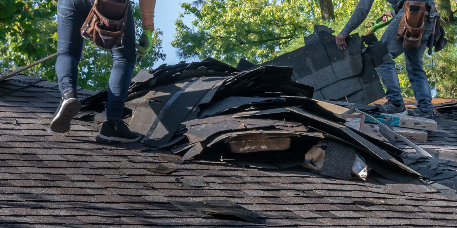 Team repairing storm-damaged residential roof and siding in Cottage Grove, OR after heavy rainfall and wind